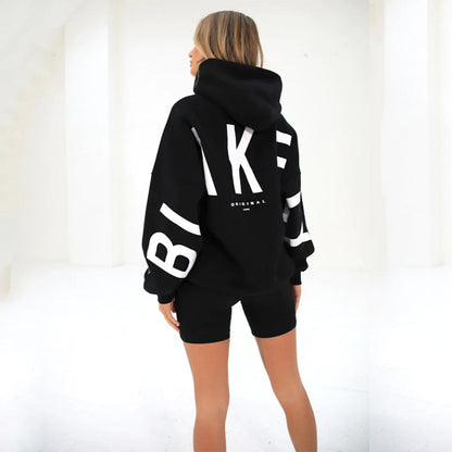 Lovéa - Oversize Kapuzenpullover für Frauen mit auffälligem Textdruck