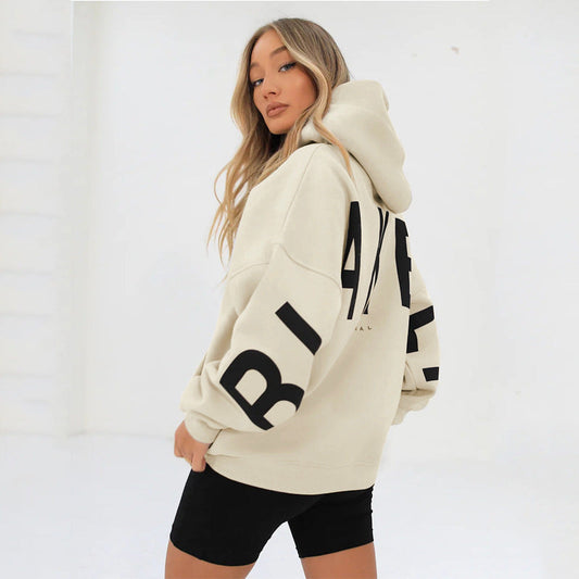 Lovéa - Oversize Kapuzenpullover für Frauen mit auffälligem Textdruck