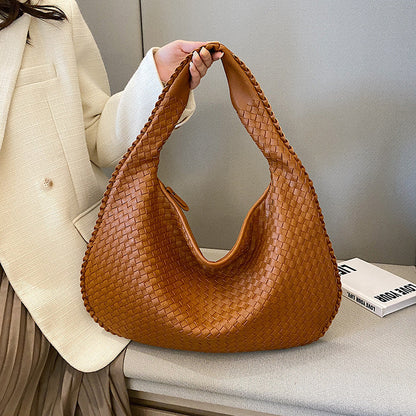 Dévia - Schultertasche aus geflochtenem Eco-Leder