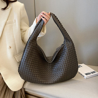 Dévia - Schultertasche aus geflochtenem Eco-Leder