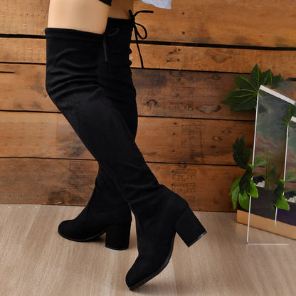 Éliarande - Schwarze Overknee-Stiefel aus Wildleder mit Schleife und Blockabsatz