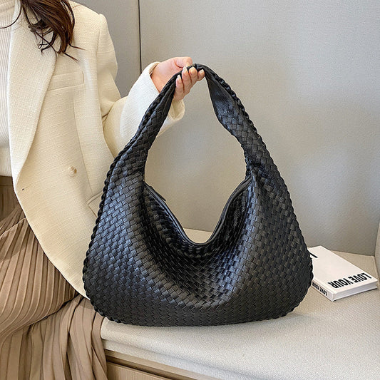 Dévia - Schultertasche aus geflochtenem Eco-Leder