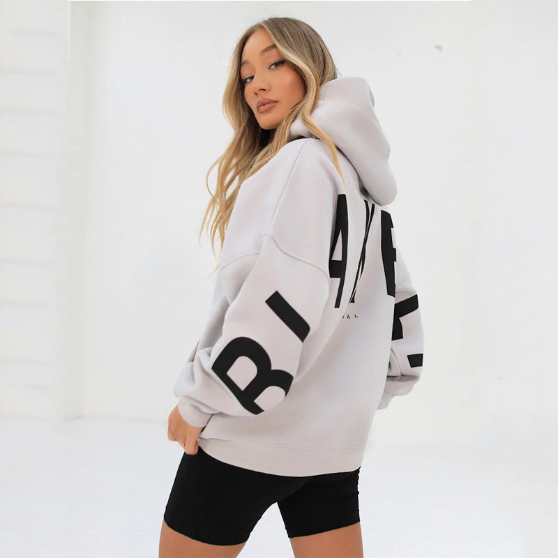 Lovéa - Oversize Kapuzenpullover für Frauen mit auffälligem Textdruck