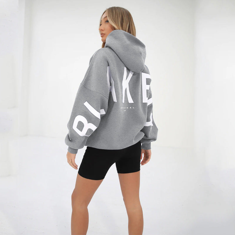 Lovéa - Oversize Kapuzenpullover für Frauen mit auffälligem Textdruck