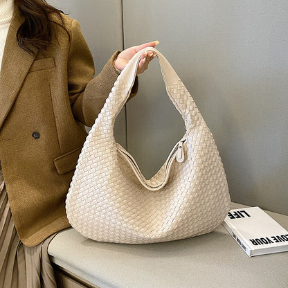 Dévia - Schultertasche aus geflochtenem Eco-Leder