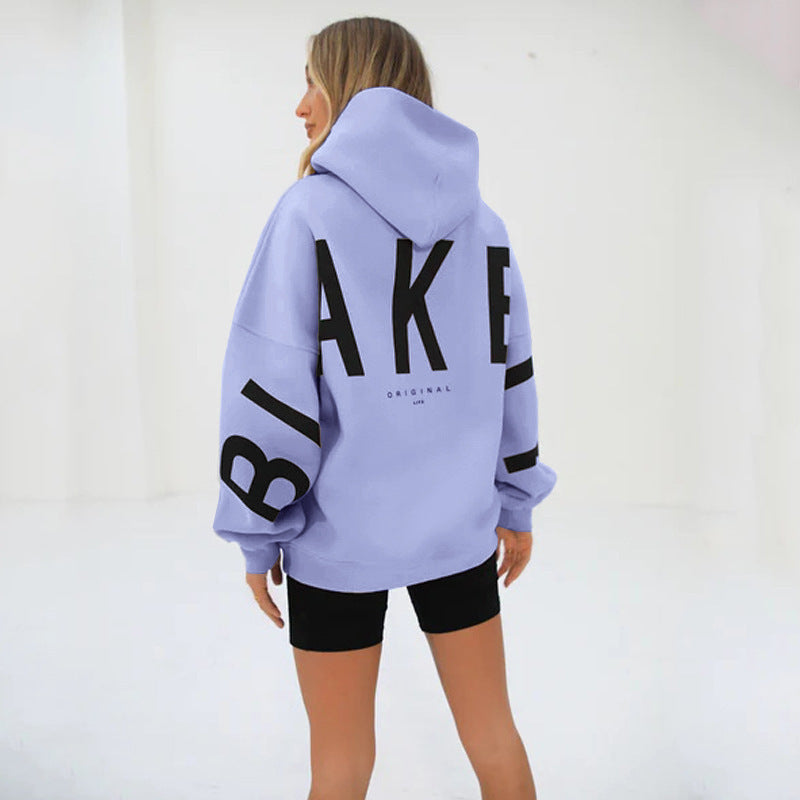 Lovéa - Oversize Kapuzenpullover für Frauen mit auffälligem Textdruck
